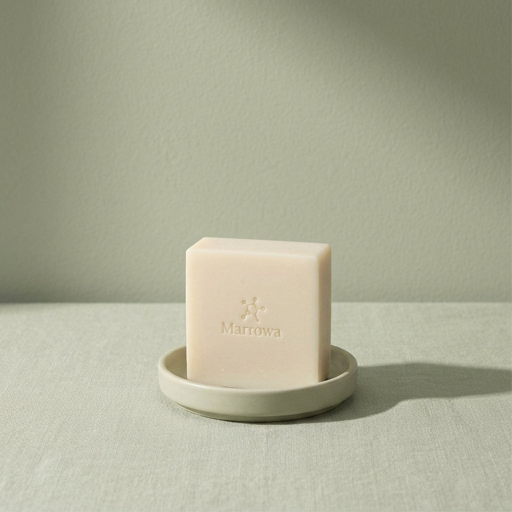 Marrowa gentle tallow cleansing bar resting on a pale sage surface